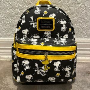 Loungefly Peanuts Snoopy and Charlie Brown Allover Mini Backpack